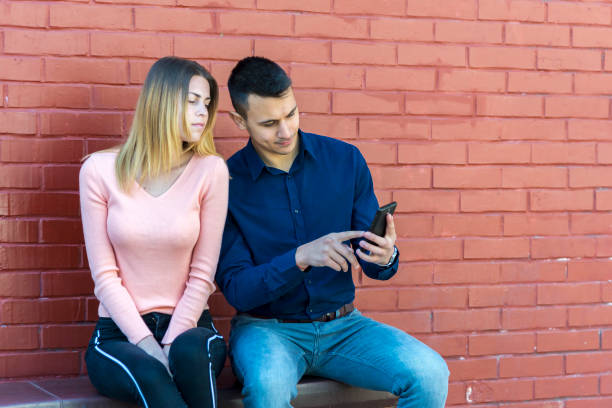 istock Young couple down sity street. 1265656610