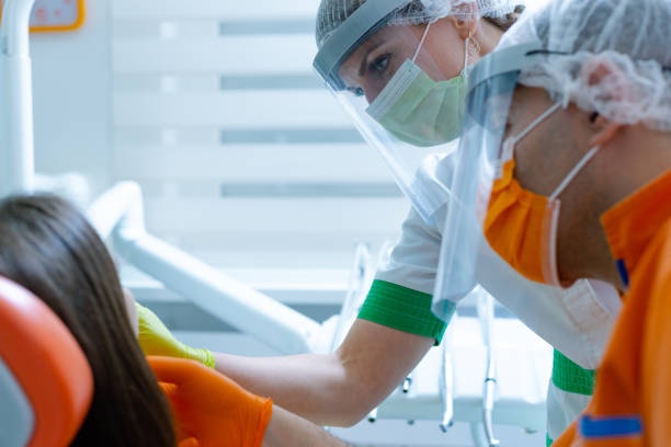 istock Dental team doing consultation with patient 1265658931