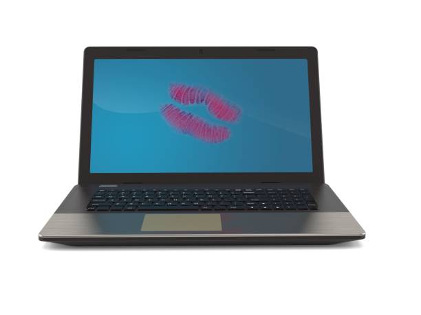 istock Laptop with lipstick kiss 1265660333