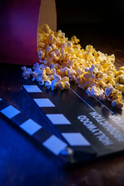 Movie theater popcorn with butter and blue backlighting