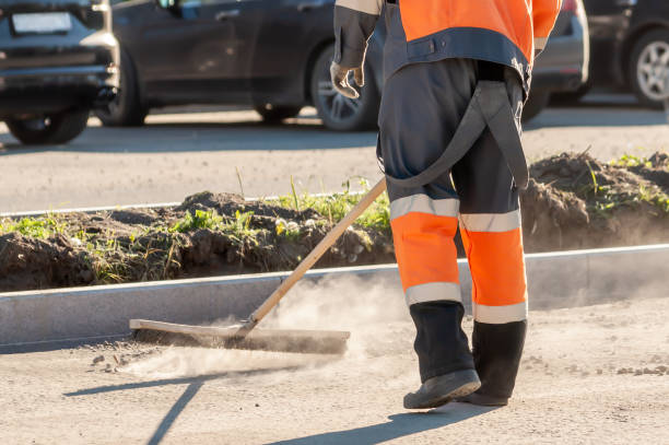 road worker with the broom
