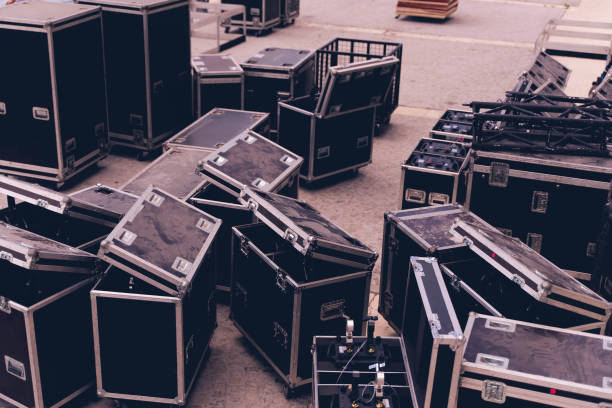 istock Boxes stage equipment for a concert on wood and old brick 1265673361