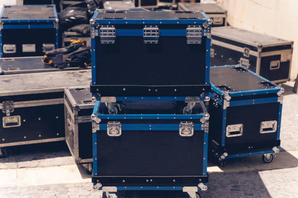 istock Boxes stage equipment for a concert on wood and old brick 1265673564