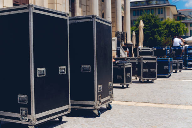istock Boxes stage equipment for a concert on wood and old brick 1265673621