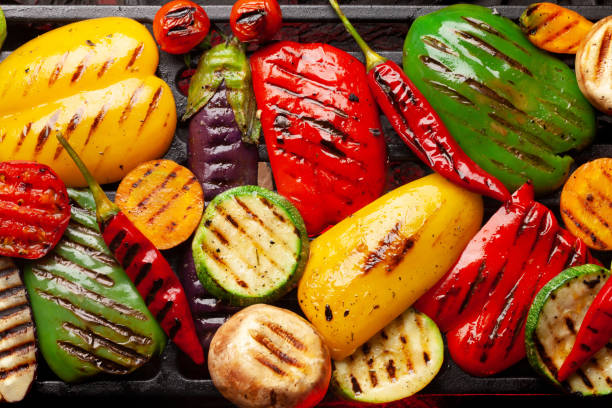 istock Grilled vegetables cooking on grill 1265674002