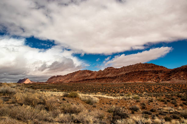 istock Rugged land and thick white clouds, AZ, USA 1265674136