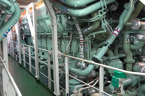 Murmansk, Russia - June 24, 2019: The engine compartment of the ship. Engine and steering equipment.