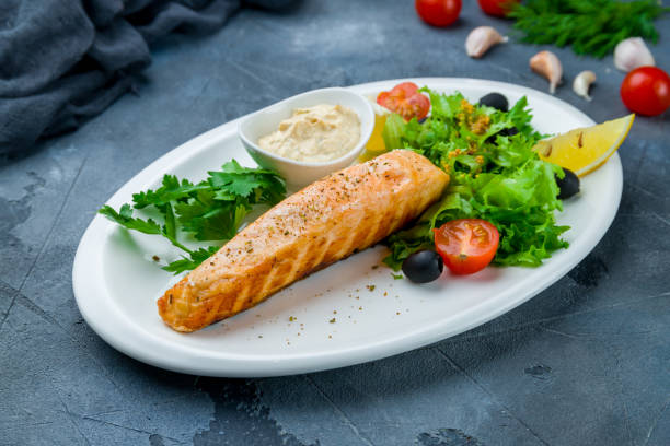 istock Salmon steak on the grill with sause tartar 1265680212