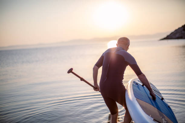 istock Portrait of a senior surfer 1265682170