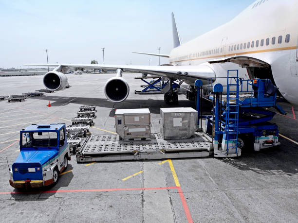 Cargo plane Cargo plane loading in Frankfurt airport frankfurt international airport stock pictures, royalty-free photos & images