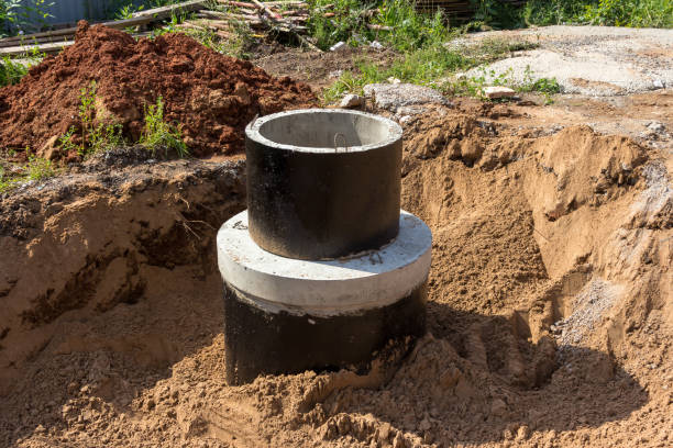 istock Sewerage during construction. Installed concrete rings for the sewer system. The channel 1265683819