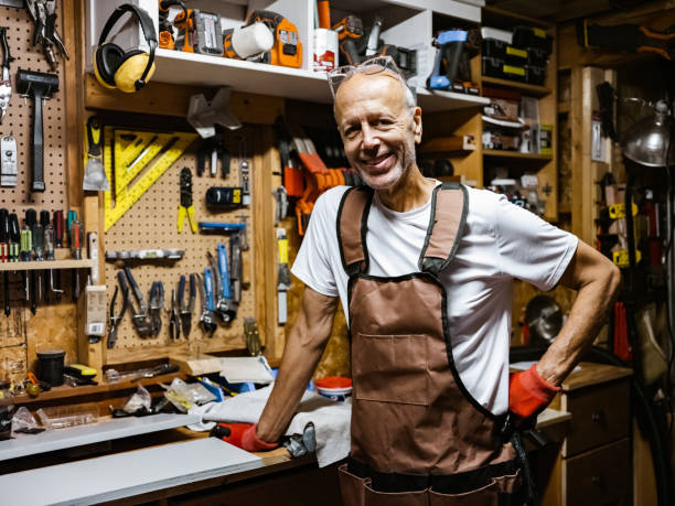 istock Senior hobby carpenter-man in his shop 1265683921
