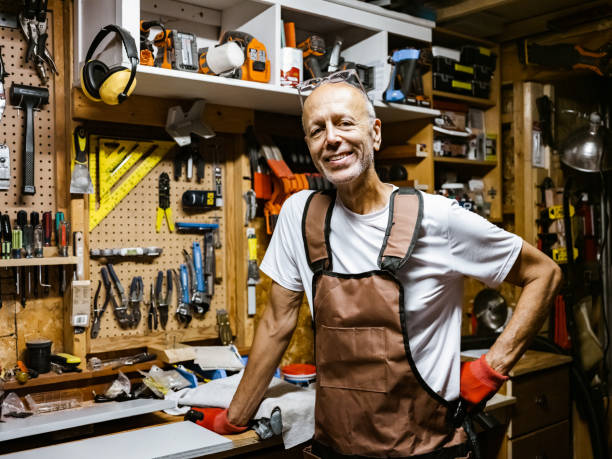 istock Senior hobby carpenter-man in his shop 1265683933