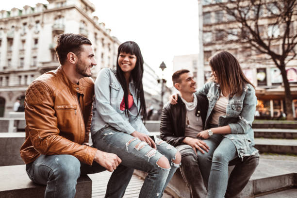 istock friends talking in the city 1265684463