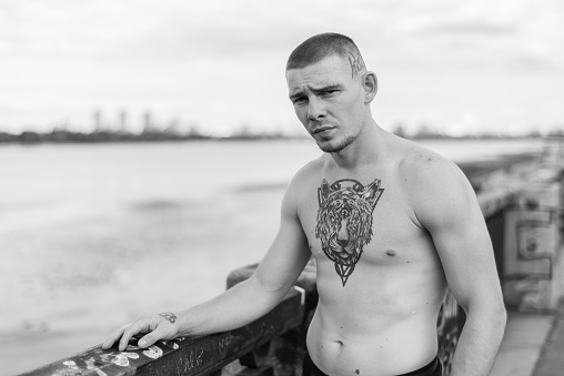 Male bully with a naked torso. Kyiv. Ukraine