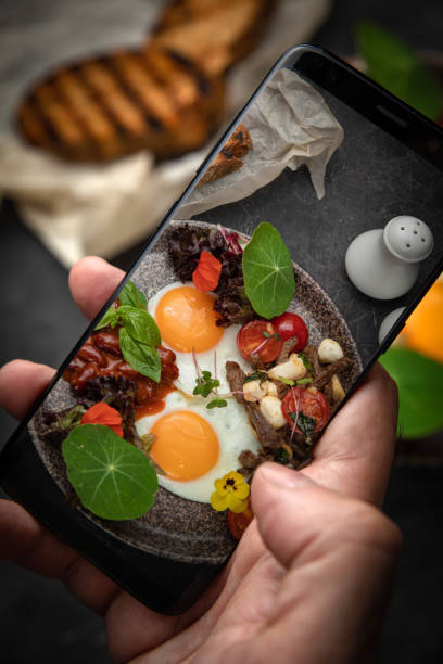 istock hearty breakfast - eggs with tomatoes, beans, meat, cheese 1265696494