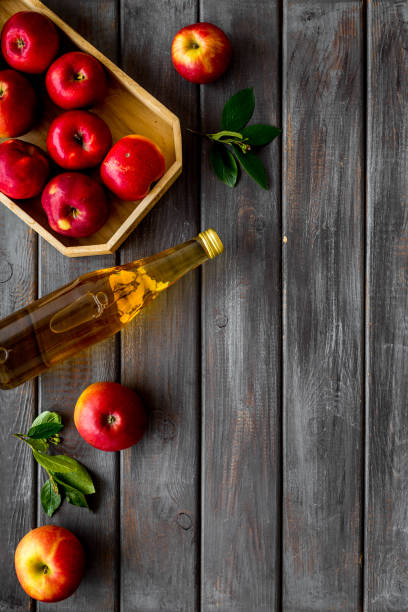 istock Bottle of apple organic vinegar or cider. Top view, copy space 1265701580
