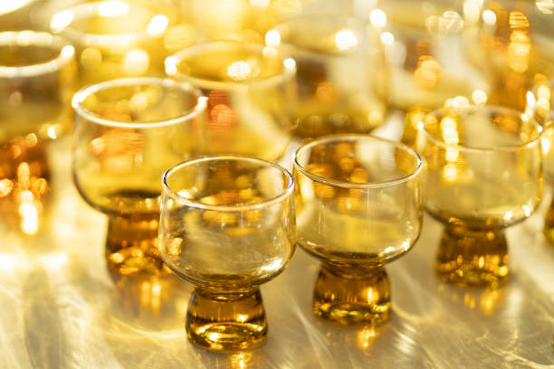 istock Vintage Honeygold Glasses close up in sunlight 1265701776
