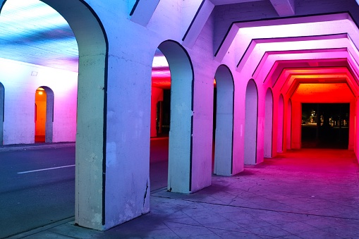 Inside rainbow colored tunnel