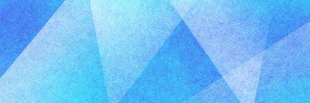 istock Abstract modern background in blue and white colors and contemporary triangle square and block shapes layered in random geometric art pattern with fine texture 1265709956