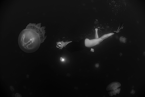 Nuclear submarine traveling underwater. Digital illustration.
