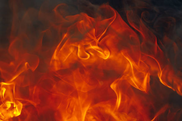 istock blazing fire background with tongues of flame 1265710783