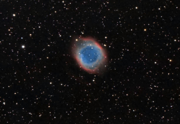 istock The Helix Nebula, also known as The Helix, NGC 7293, is a large planet 1265711343