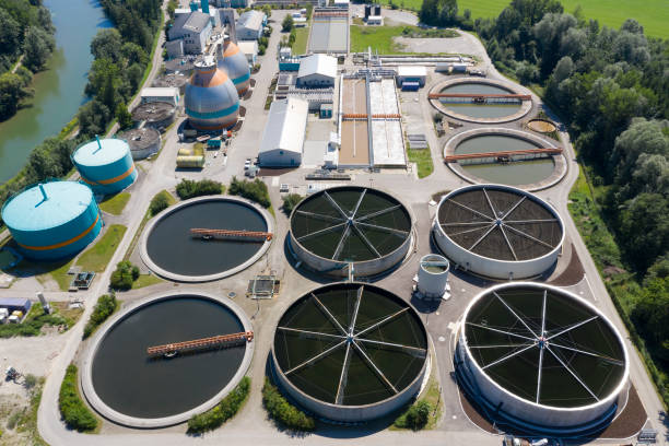 istock Sewage treatment plant on the river, aerial view 1265719135