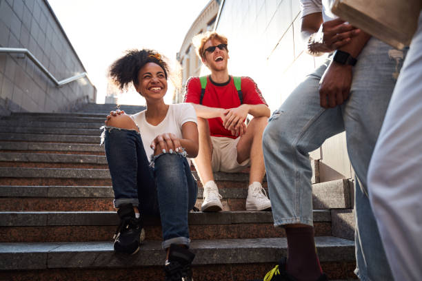 istock Cheerful young people relaxing together in city centre 1265724375