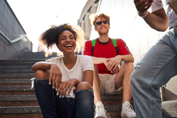 istock Happy young people having fun in downtown 1265724383