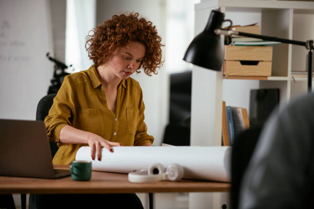 istock Beautiful businesswoman working on projects. 1265725911