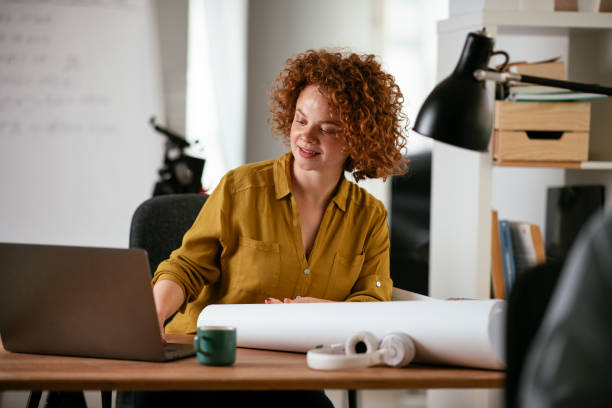istock Beautiful businesswoman working on projects. 1265728191