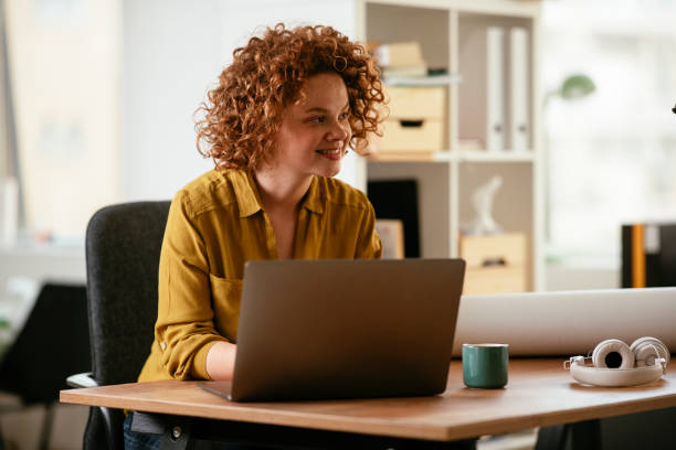 istock Beautiful businesswoman working on projects. 1265732741