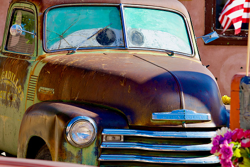 Seligman, Arizona, USA - July 30, 2020: Close-up of a vintage 1950 Chevrolet 3100 pickup truck at Delgadillo’s Snow Cap drive-in, an iconic landmark along historic Route 66 in the heart of Seligman, Arizona.