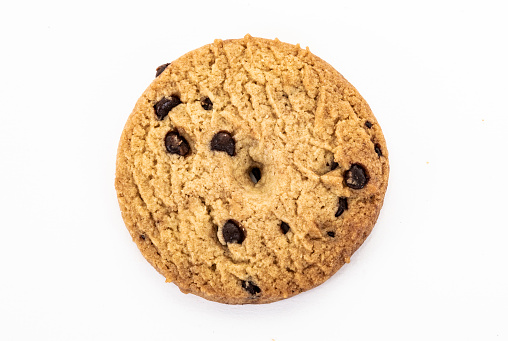 One Wheat flour cookie with chocolate chips on white background.