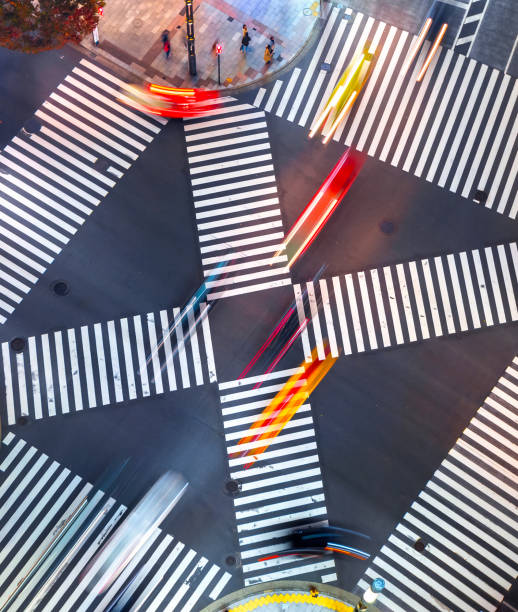 istock Traffic and people cross a busy intersection in Ginza 1265759537