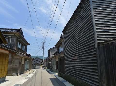 Kuroshimamachi (Kuroshima machi), Wajima, Ishikawa, Japan - June 30, 2013: It is an unique and traditional town in Japan. Famous for wooden wall and Japanese black tile.
