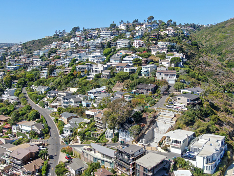 Aerial view of Laguna Beach coastline town with houses on the hills, Southern California Coastline, USA
