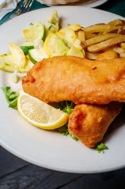 British fish and chips with sauteed zucchini squash and tartar sauce