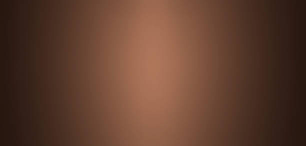 istock Dark brown background with light. Abstract chocolate background. 1265851715