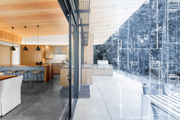 istock Home interior kitchen remodel construction with blueprint line drawing transition to blend fade into finished project 1265851952