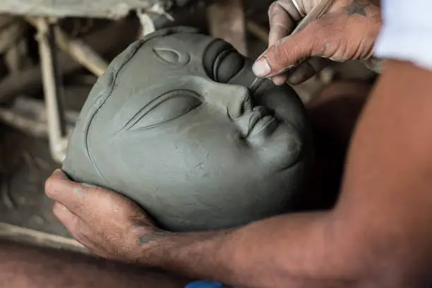 Making of goddess Durga idol.  These idols are made for Durga puja, the biggest festival of West Bengal.