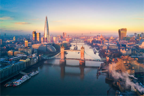 Aerial view of London and the Tower Bridge Aerial view of London and the Tower Bridge, England, United Kingdom river thames stock pictures, royalty-free photos & images