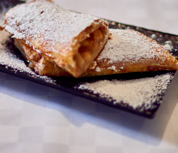 istock strudel lies on a plate on the table 1265914965
