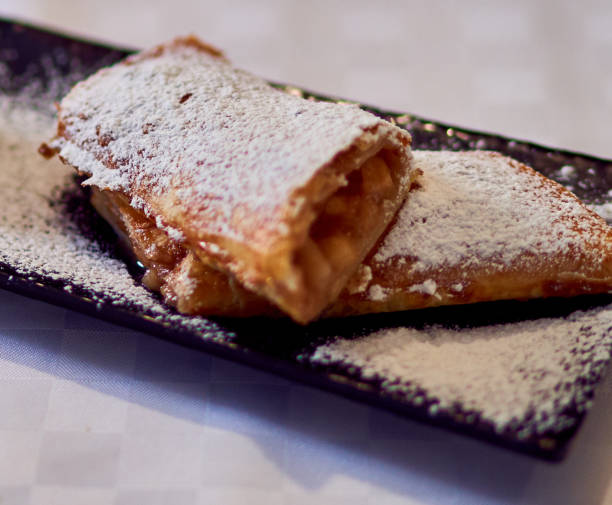 istock strudel lies on a plate on the table 1265914985