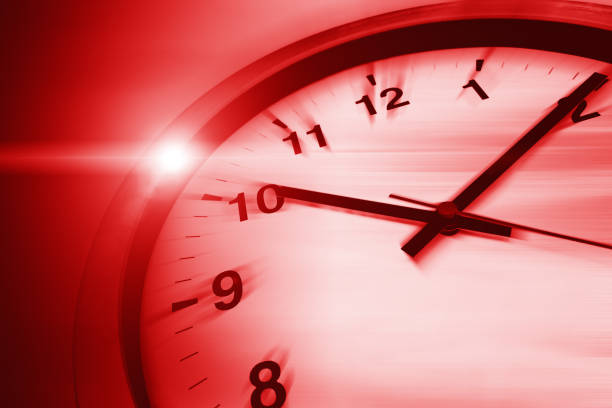 istock Fast speed dangerous times clock virus crisis hours concept, red color tone. 1265915632