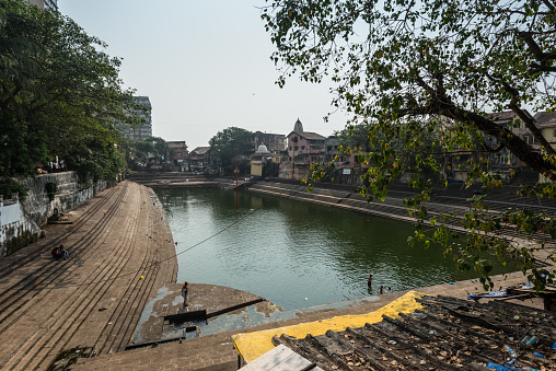 Mumbai, India - November 22, 2019: Banganga tank, Mumbai Malabar Hills district of Mumbai, formerly Bombay. The lake is sacred to Hindus and there are a number of temples surrounding the water.