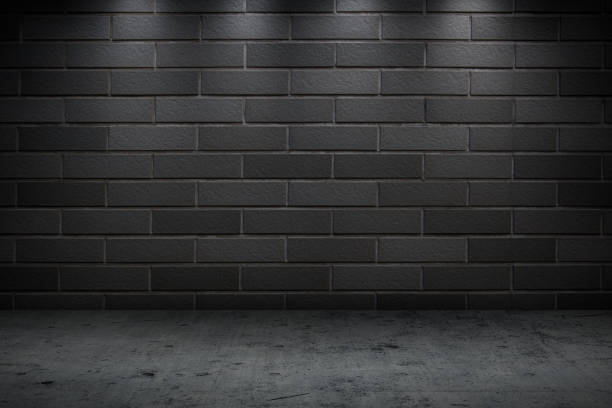 istock dark concrete wall street night building for background 1265921917