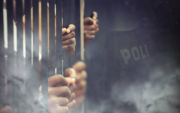 tear gas thrown to the protesters tear gas thrown to the protesters behind bars tear gas photos stock pictures, royalty-free photos & images