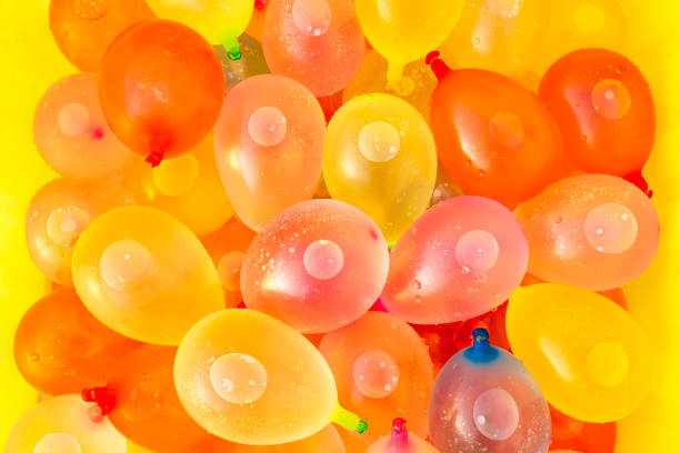 color balloons floating in a pool
